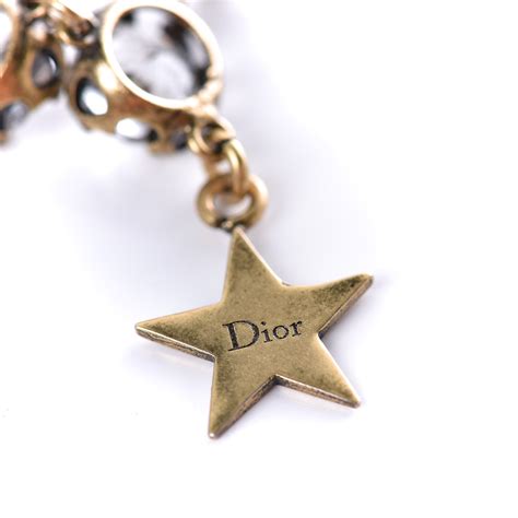 dior saturn necklace|dior star necklace.